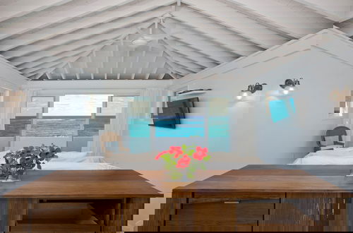 Foto 1 - Touch Of Class Cottage: Beachfront Oasis