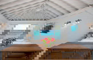 Foto 1 - Touch Of Class Cottage: Beachfront Oasis