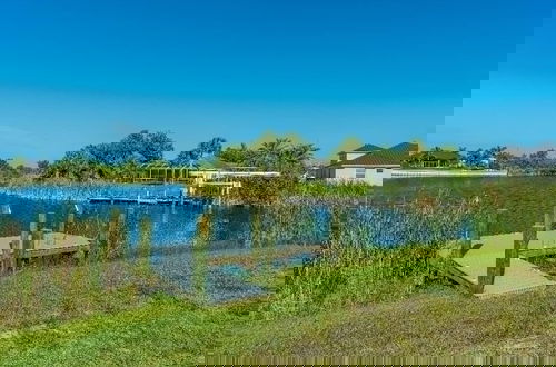 Photo 9 - Canal Dreams 3 BR 2 BA Pool Home on the Canal
