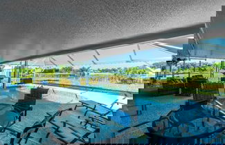 Photo 2 - Canal Dreams 3 BR 2 BA Pool Home on the Canal