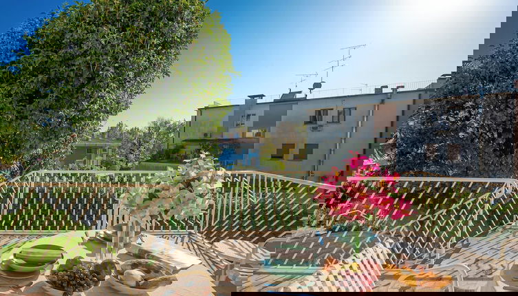 Foto 1 - La Maison Fleurie Appartamento Glicine