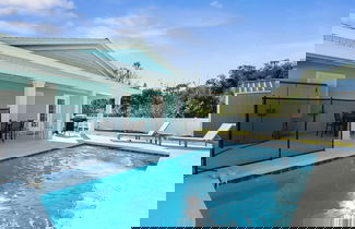 Photo 2 - Beach Home w Heated Pool Free Golf Cart