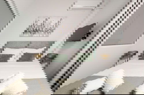 Foto 3 - Zen City Apartment