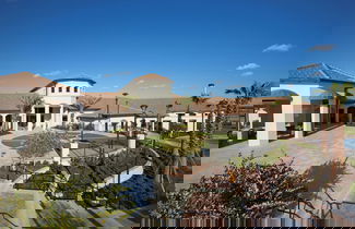 Photo 1 - Champions Gate condos by UNE