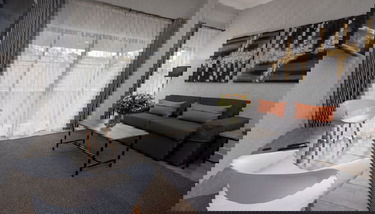 Foto 1 - The Gray Apartments