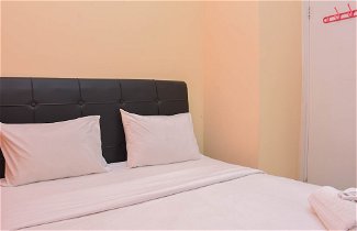 Photo 3 - Comfort And Homey 2Br At Green Pramuka City Apartment