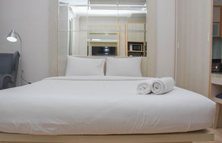 Photo 1 - Comfortable And Warm Studio Room At Menteng Park Apartment