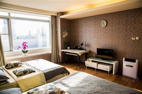Foto 15 - Tianjin Jinta Jinhai Suite Apartment