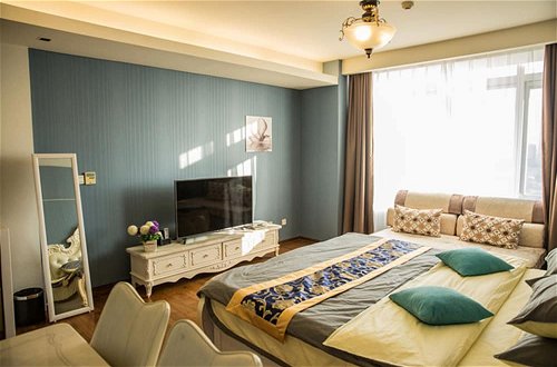 Foto 2 - Tianjin Jinta Jinhai Suite Apartment