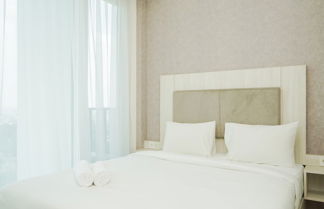 Photo 3 - Comfy and Minimalist Studio Apartment at Tree Park BSD