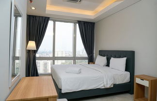 Photo 1 - Luxury 2BR at The Empyreal Condominium Epicentrum Apartment