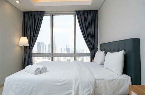 Photo 2 - Modern and Comfortable 2BR at The Empyreal Condominium Epicentrum Apartment