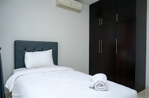 Photo 6 - Modern and Comfortable 2BR at The Empyreal Condominium Epicentrum Apartment