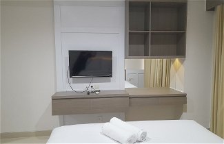 Photo 2 - Cozy Studio Room At Patraland Amarta Apartment