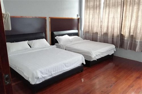 Foto 7 - Comfortable Family Room for 4 People in Kuching With Ac - Amida Point Services