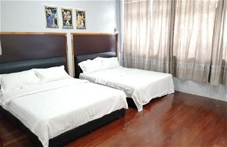 Foto 2 - Comfortable Family Room for 4 People in Kuching With Ac - Amida Point Services