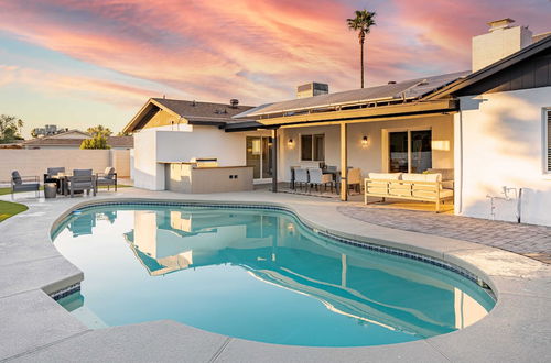 Photo 1 - Grayhawk by Avantstay Modern Home w/ Pool, Hot Tub, Bocce, Fire Pit, Pool Table, Putt-putt & Putting Green