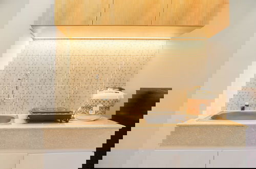 Photo 8 - Minimalist And Homey Studio At Evenciio Margonda Apartment