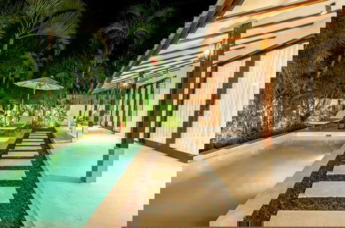 Photo 42 - Udara by EVDEkimi - Spacious 4BR Pool villa with Lush garden at Artistic Center of Ubud