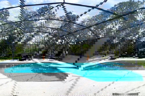 Foto 28 - Great Privacy By Pool- Pool Home With Game Room 4 Bedroom Home by RedAwning