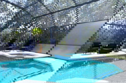 Foto 27 - Great Privacy By Pool- Pool Home With Game Room 4 Bedroom Home by RedAwning