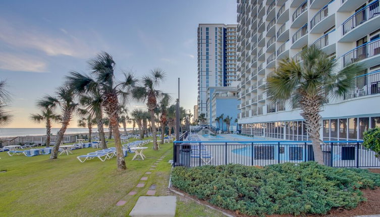 Photo 1 - Oceanfront Boardwalk Condo w Private Balcony & Close to the Beach