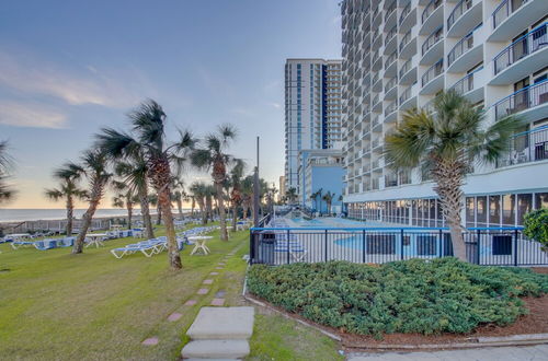 Photo 1 - Oceanfront Boardwalk Condo w Private Balcony & Close to the Beach