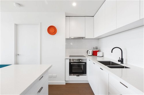 Foto 9 - Ilixir Apartments by Ready Set Host