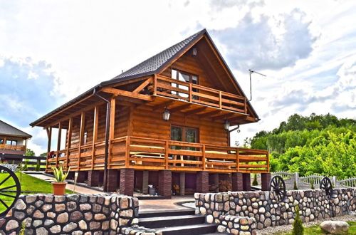 Photo 32 - A Luxury Home on the Shore of the Lake. Living Room With Fireplace, 2 Bedrooms