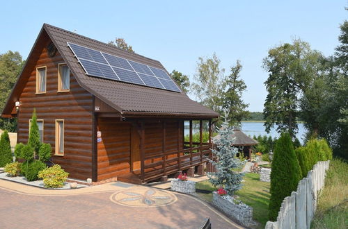 Photo 1 - A Luxury Home on the Shore of the Lake. Living Room With Fireplace, 2 Bedrooms