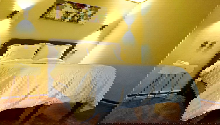 Foto 1 - R Suites