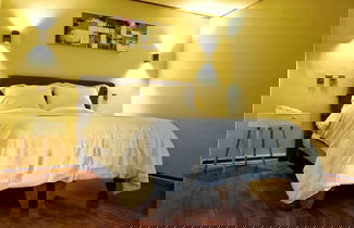 Foto 1 - R Suites