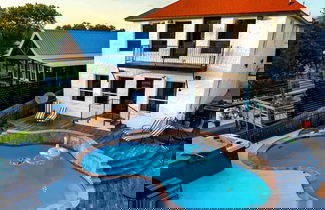 Photo 1 - Lakefront Home w/ Pool, Spa, & Game Room!
