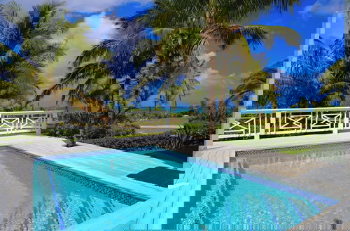 Photo 14 - Beachside Beauty: Brand New Home With Pool