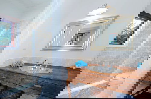 Photo 10 - Beachside Beauty: Brand New Home With Pool