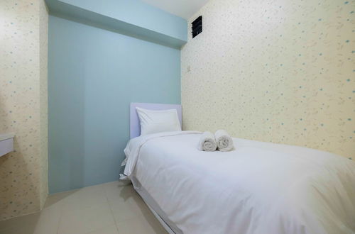 Photo 3 - Comfy 2BR Bassura City Apartment Near Mall