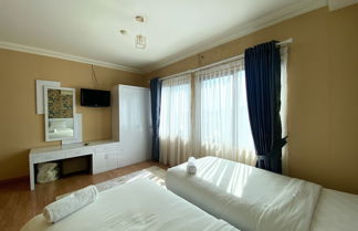 Photo 2 - Cozy Furnished 3Br At Grand Setiabudi Apartment