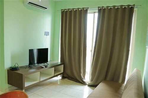 Photo 14 - Cozy Living 2Br At City Home Apartment Near Moi Kelapa Gading