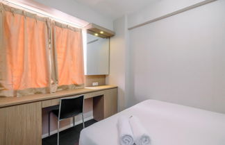 Photo 2 - Nice And Fresh 2Br At Bassura City Apartment