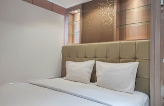 Photo 2 - Comfort 2Br At Vida View Makassar Apartment