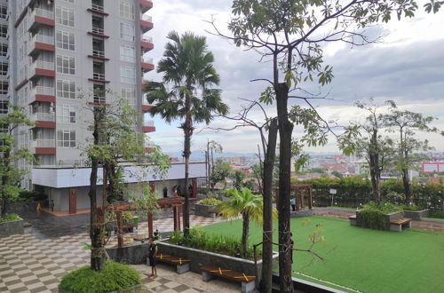 Foto 18 - Comfort 2Br At Vida View Makassar Apartment
