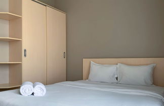 Photo 2 - Best Choice Studio Room At Ciputra International Apartment