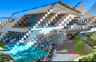 Photo 1 - Gusto Comfortable Holiday Residence