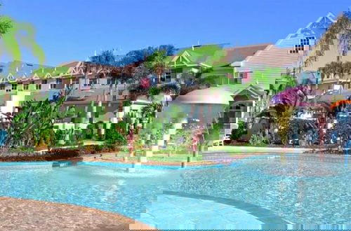 Foto 5 - Heng's Runaway Beach Condo