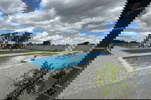 Foto 5 - Luxurious Motherland Apartments