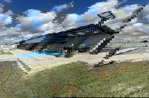 Foto 11 - Luxurious Motherland Apartments