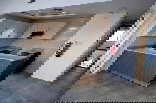 Foto 5 - Cozy 1 BHK Apartment in Palette Tower in Tourist Club Area