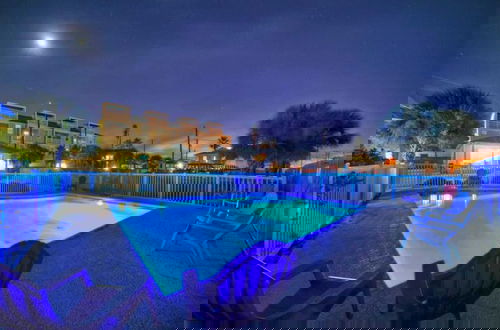 Photo 12 - Shared Pool, Walkable to Beach, Vibrant Beachy Design! Bay Bliss by Avantstay