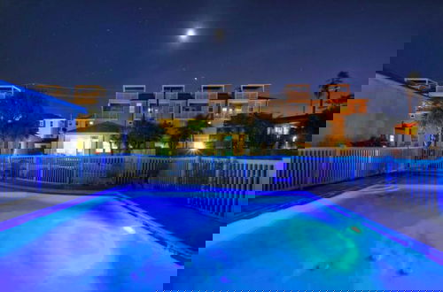 Photo 9 - Shared Pool, Walkable to Beach, Vibrant Beachy Design! Bay Bliss by Avantstay