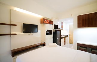 Photo 3 - Compact And Cozy Stay Studio At Bale Hinggil Apartment